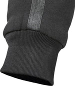 Närbild på benslutet av GMS Kevlar Mc-Mjukisbyxor Jogger Cruz Svart med ribbad mudd och reflexband för synlighet.