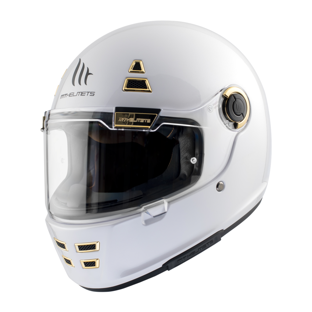 MT Helmets Integral Mc-Hjälm Jarama A0 Pearl White med vit finish, gulddetaljer och ventilationsöppningar. Modern och säker hjälm för motorcyklister.